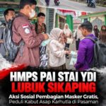 Peduli Kabut Asap Karhutla, HMPS PAI STAI YDI Lubuk Sikaping Bagikan Masker Gratis kepada Masyarakat